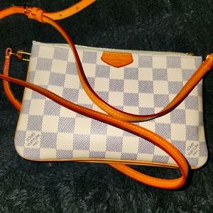 Double pouchette Louise Vuitton